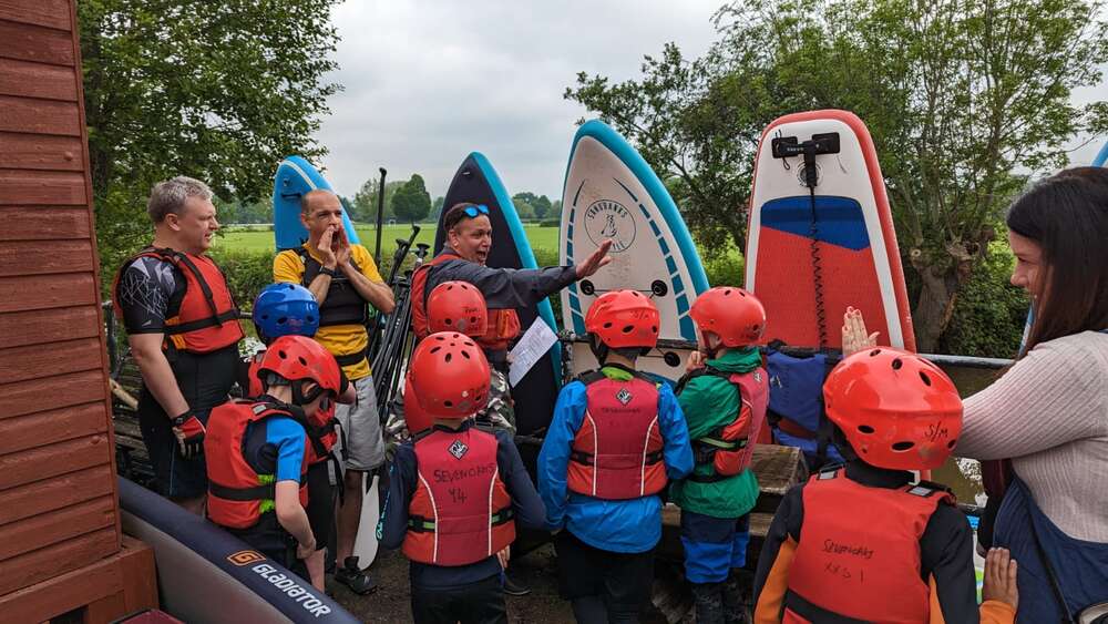 Cub paddleboarding